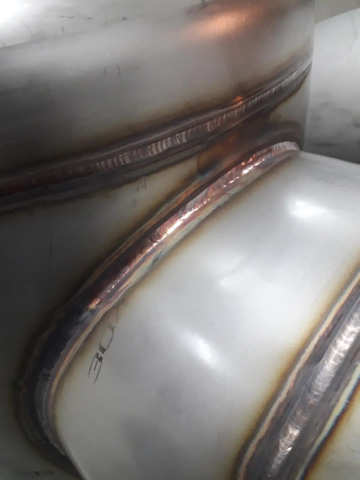 Stainless steel vessel with side connections for dairy plant